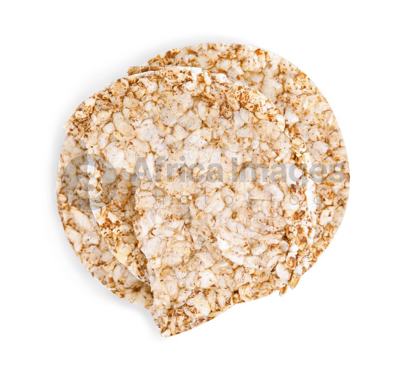 Tasty crunchy buckwheat cakes on white background, top view