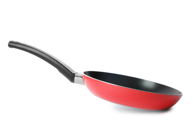 Modern red frying pan isolated on white