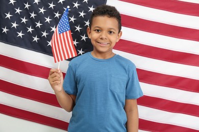 Happy African American boy with national flags