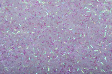 Beautiful shiny lilac glitter as background, closeup