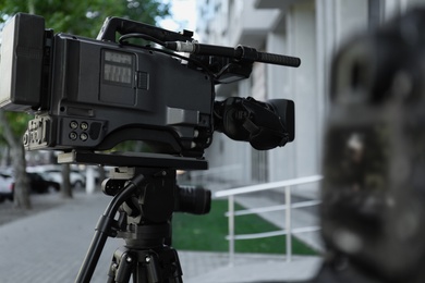 Modern video cameras outdoors. Professional media equipment