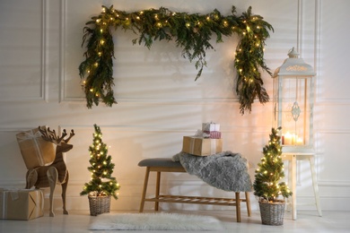 Beautiful Christmas themed photo zone with fir decor