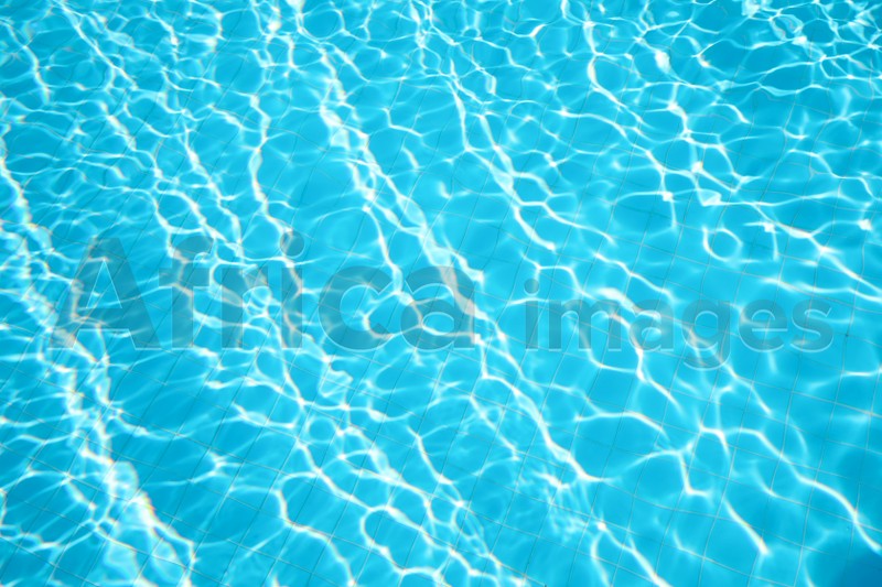 Clear water in outdoor swimming pool on sunny day