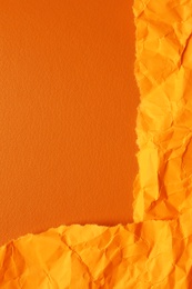 Orange textured materials as background, closeup view