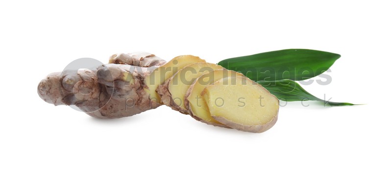 Photo of Cut fresh ginger and leaves isolated on white