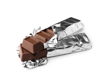 Photo of Delicious wrapped chocolate bars on white background