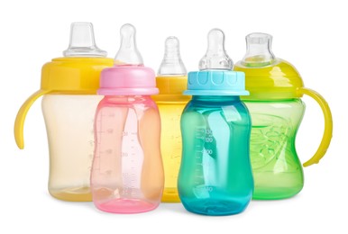 Photo of Many empty feeding bottles for infant formula on white background
