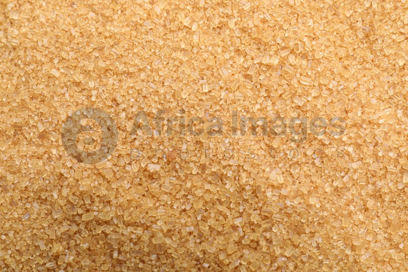 Pile of brown sugar as background, closeup