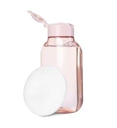Bottle of micellar cleansing water and cotton pad isolated on white