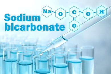 Text Sodium bicarbonate with soda formula and test tubes on background