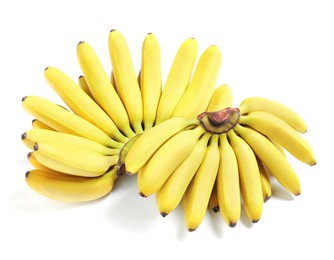 Bunches of ripe baby bananas on white background