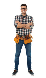 Photo of Handsome carpenter with tool belt isolated on white