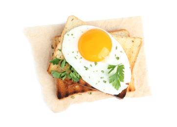Tasty fried egg with toasts and parsley isolated on white, top view