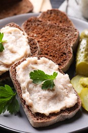 Photo of Delicious sandwiches with lard spread on plate, closeup
