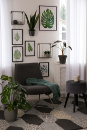 Living room interior with beautiful artworks on wall