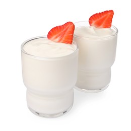 Glasses with delicious yogurt and strawberries on white background