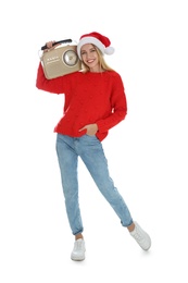 Happy woman with vintage radio on white background. Christmas music