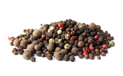 Mix of different pepper grains isolated on white