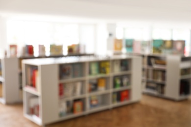 Blurred view of library interior with bookcases