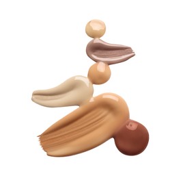 Image of Different shades of liquid foundation on white background, top view