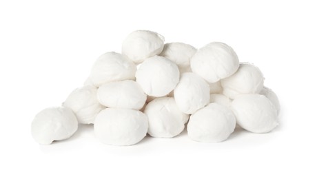 Pile of mozzarella cheese balls on white background