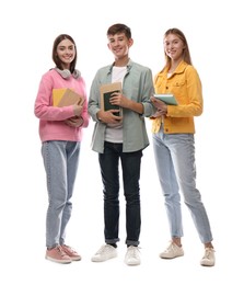 Group of teenage students with stationery on white background