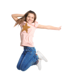 Full length portrait of preteen girl jumping on white background