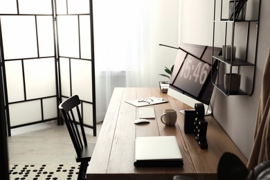 Modern workplace with computer in room. Interior design