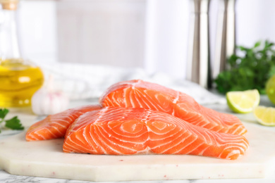 Fresh raw salmon on stone board. Fish delicacy