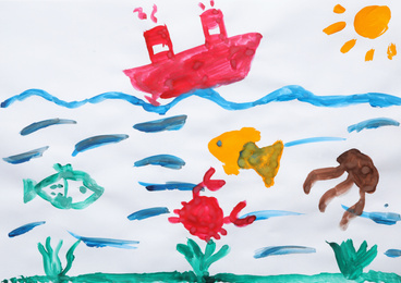 Child's painting of ship and underwater life on white paper