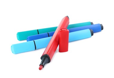 Many colorful markers on white background. School stationery