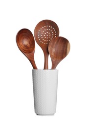 Set of wooden kitchen utensils in holder isolated on white