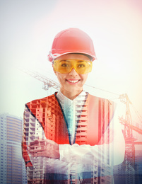 Double exposure of female industrial engineer in uniform and construction 