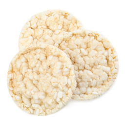 Puffed rice cakes isolated on white, top view. Healthy snack