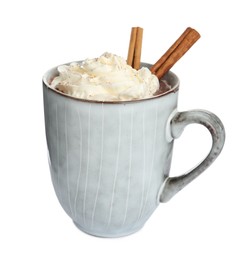 Cup of delicious hot chocolate with whipped cream and cinnamon sticks isolated on white