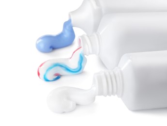 Tubes with toothpaste on white background. Dental care
