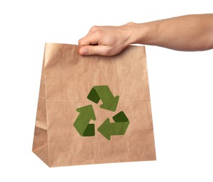 Man holding paper bag with recycling symbol on white background, closeup