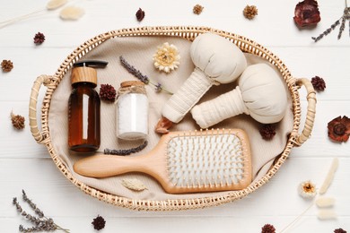 Photo of Spa gift set with different personal care products on white wooden table, flat lay