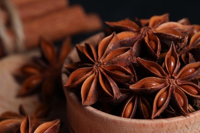 Aromatic anise stars in bowl, closeup view