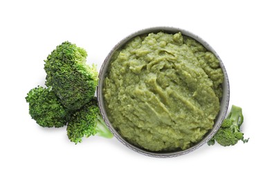 Photo of Delicious vegetable puree and fresh broccoli on white background, top view. Healthy food