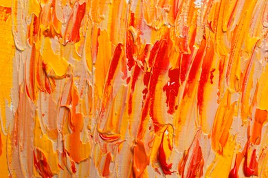 Strokes of colorful oil paints as background, closeup