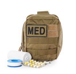 Photo of Military first aid kit with items isolated on white