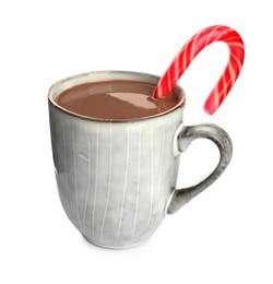 Cup of delicious hot chocolate with candy cane isolated on white