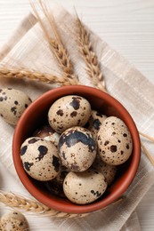 Photo of Flat lay composition with quail eggs on white wooden table