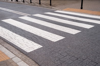 Photo of View on pedestrian crossing in city. Road regulations