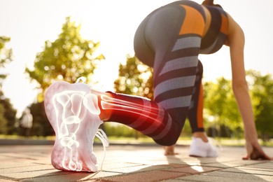 Image of Digital composite of highlighted bones and woman ready for running outdoors, low angle view