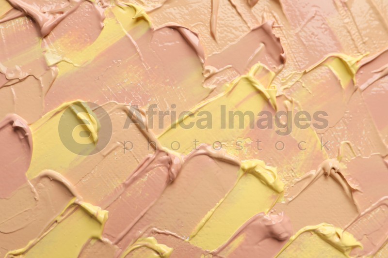 Photo of Strokes of different pastel oil paints as background, closeup