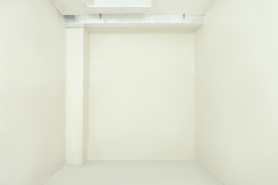 Photo of Empty room with white walls and window