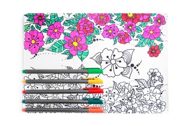Antistress coloring page and felt tip pens on white background, top view