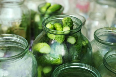 Glass jar with fresh cucumbers, closeup. Pickling vegetables